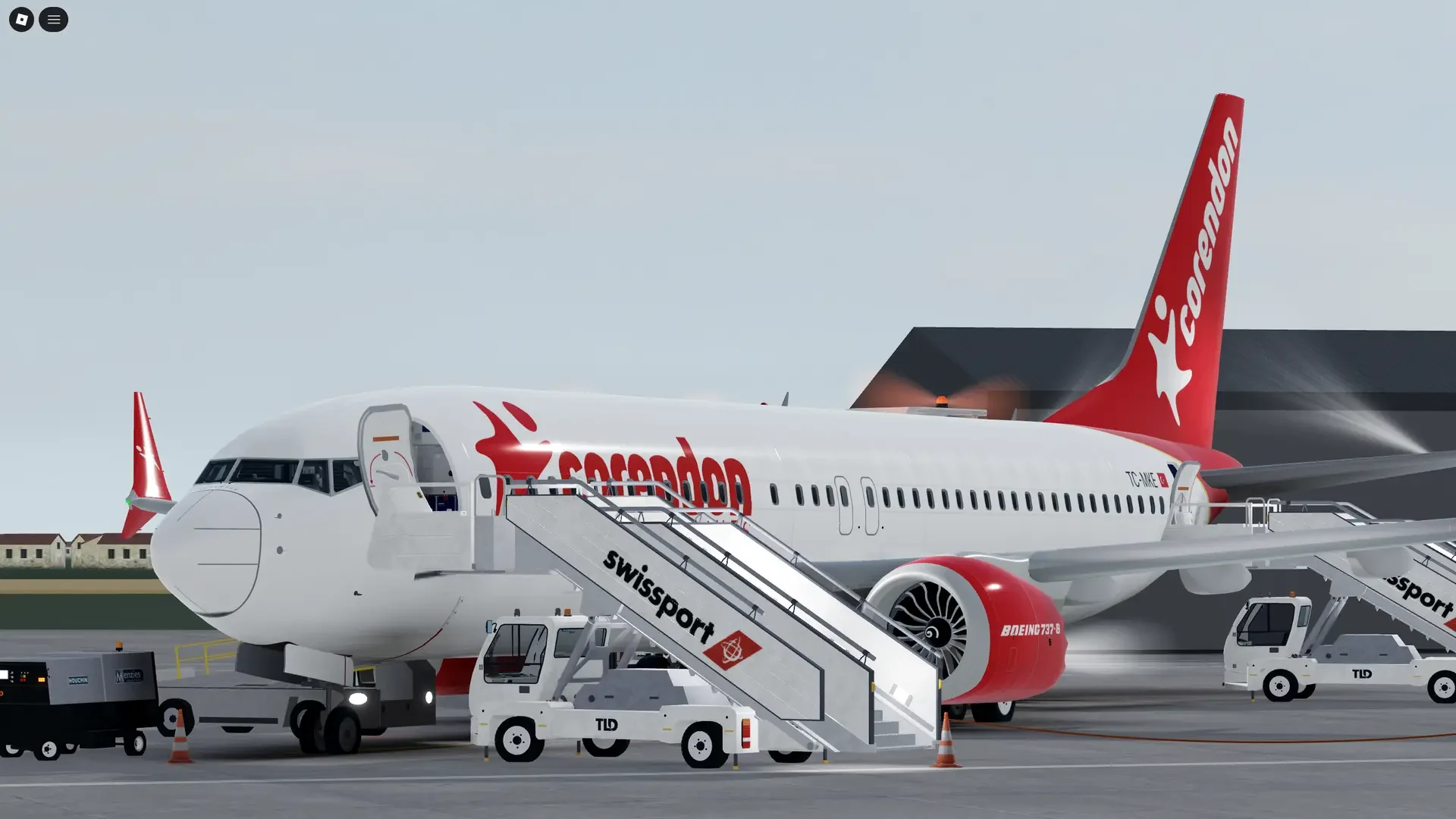Corendon Airlines Roblox aircraft with ground service vehicles in daylight