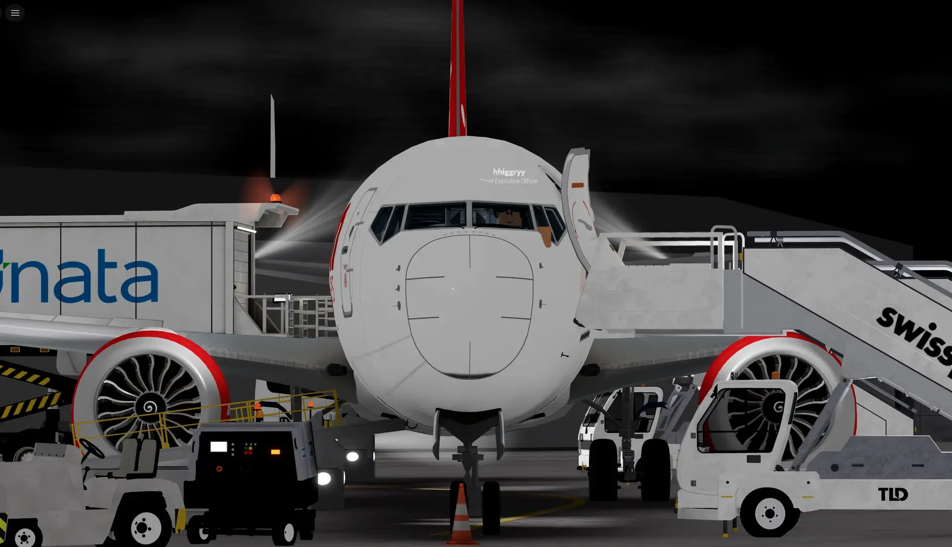 Front view of a Corendon Airlines Roblox aircraft with its ground support team